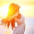 Enjoyment – free happy woman enjoying sunset